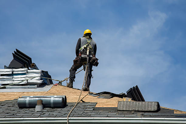 Professional Roofing technician working in Nora Springs, IA